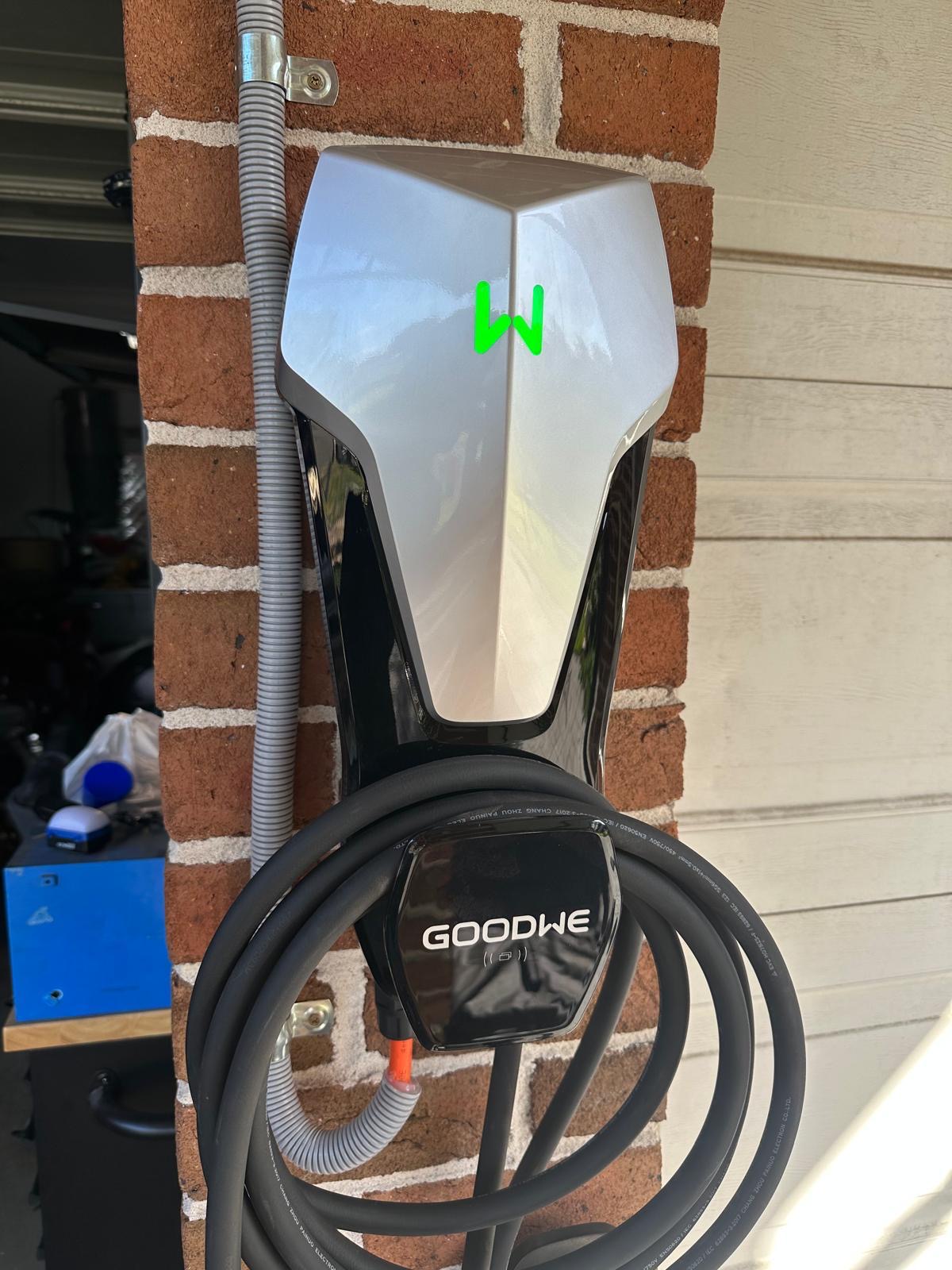 Wall mounted EV charger installed in a garage