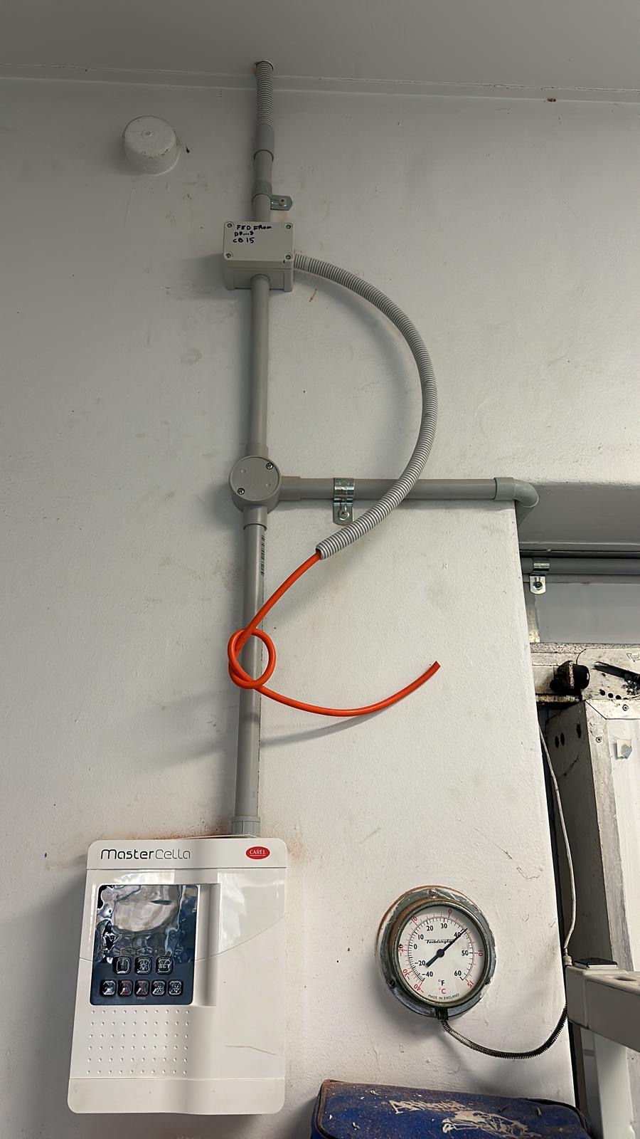 Cool room controller and conduit run wired in a shop